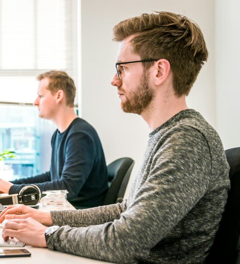 Developers working at their monitors